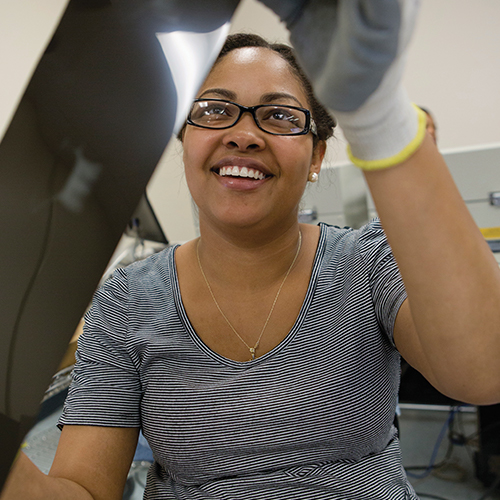 Employee scanning an x-ray